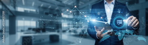 Fotografía Businessman using tab analyzing growth graph data on software development, appli