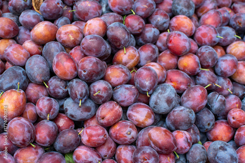 A Bountiful Pile of Fresh Red and Purple Plums