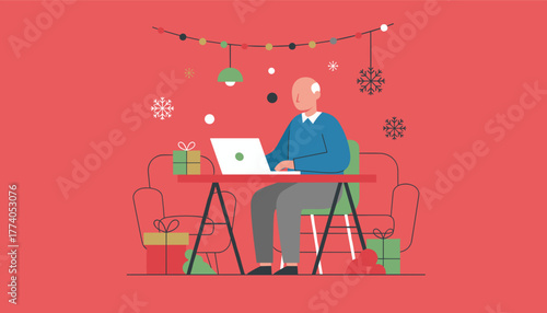 Elderly man working remotely on a laptop during the festive Christmas and New Year season