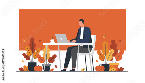 Remote work during autumn Man using laptop at an outdoor table with coffee and fall decor