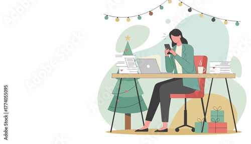 Businesswoman busy working during the holidays checking phone at a festive office desk