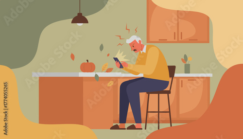 Angry senior man frustrated by technology in the kitchen Autumn concept