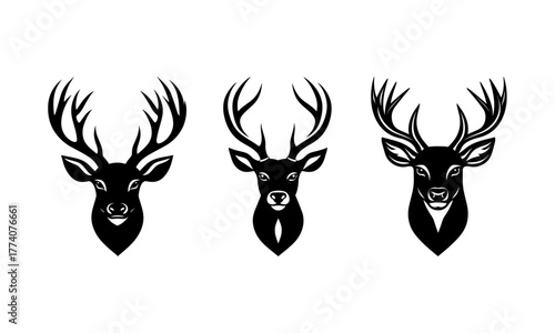 Three vector silhouettes of a majestic deer stag head with large antlers.