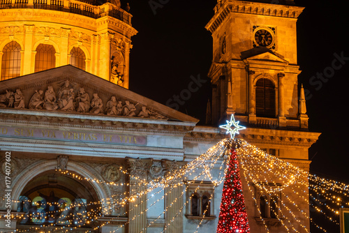 Christmas Advent fair with colorful lights in the square in front of the Saint Stephen's Basilica in Budapest
