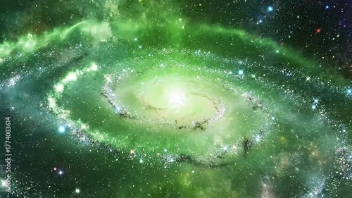 Vibrant green galaxy swirls with bright starburst at its core, showcasing cosmic wonder and vastness.
