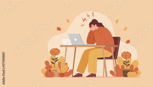 Woman suffering from a headache and work burnout while sitting at her desk in an autumnthemed office