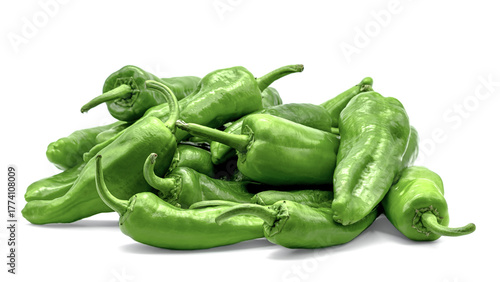 Fresh green Italian friggitello chili peppers piled together on a white background, showcasing their shiny texture, vibrant color, and natural freshness as a healthy vegetable ingredient.