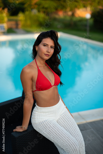woman in red bikini at pool