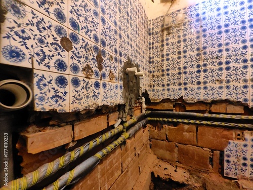 Renovation of old bathroom. Plumbing work. Plastic pipes inside wall