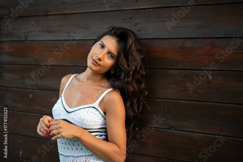 woman in white dress at pool