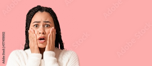 Scared African-American wom...
