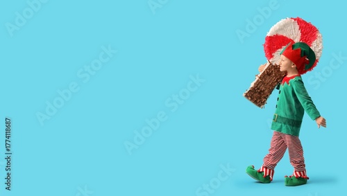 Cute little elf with candy ...