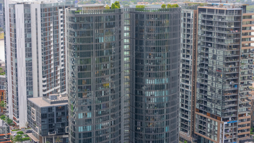 Obraz premium Aerial Drone View of Wentworth Point and Rhodes a suburb in western Sydney newly built residential high rise apartments area on Parramatta River Sydney NSW Australia