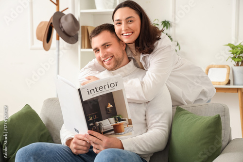 Happy young woman hugging h...