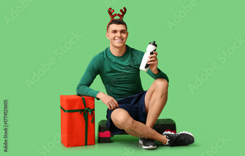Young sporty man in reindee...