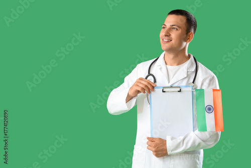 Male doctor with flag of In...