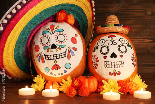Pumpkins with painted skull...