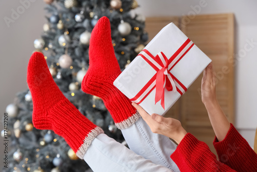 Woman in warm red socks wit...