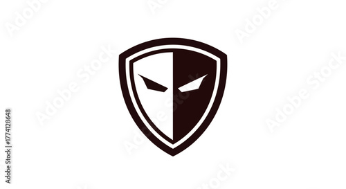 Abstract shield icon with masked face in black and white design