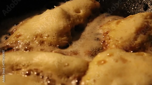 close-up of fried food in a pan