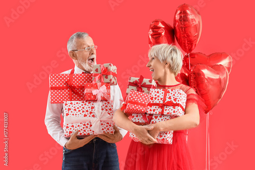 Shocked mature couple with ...