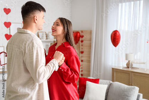 Young couple in love holdin...