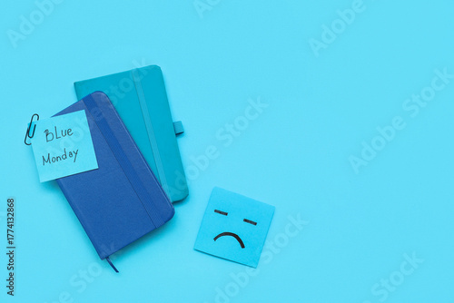 Notebooks with drawn sad fa...