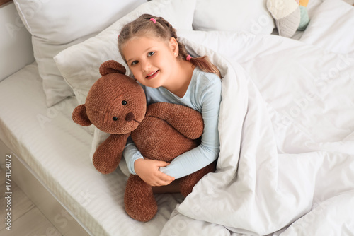 Cute little happy girl in p...