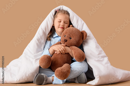 Cute little sleepy girl in ...