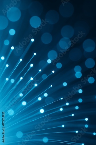 Glowing blue fiber optic cables showing fast internet connection and digital data transfer in a futuristic style.