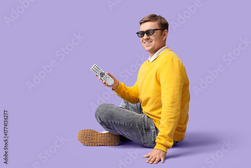 Young man in 3D glasses wit...