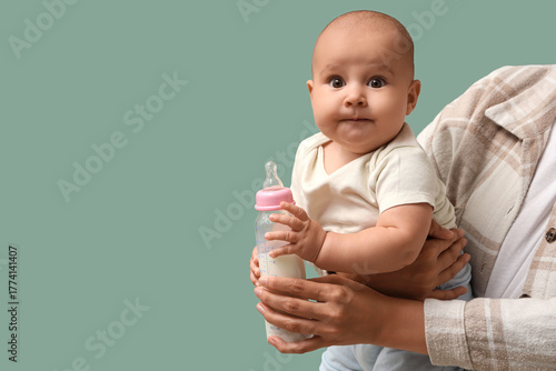 Mother with baby and bottle...