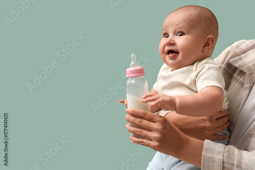 Mother with baby and bottle...