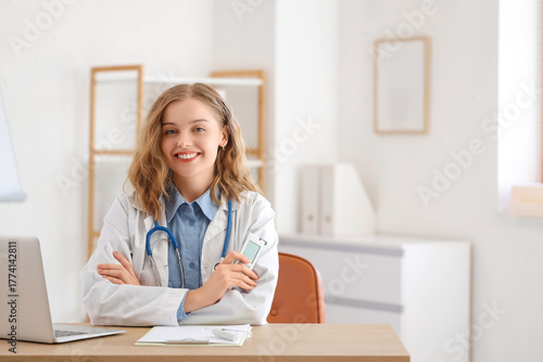 Female doctor with glucomet...