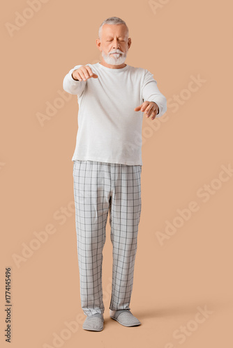 Senior male sleepwalker in ...