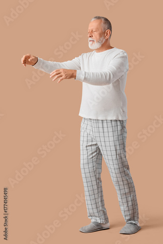 Senior male sleepwalker in ...
