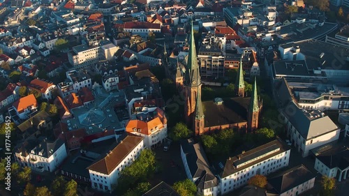 An aerial panorama view above the old town of the city Oldenburg on a sunny spring morning in Germany