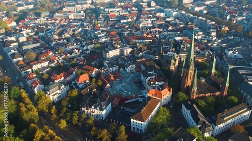 An aerial panorama view above the old town of the city Oldenburg on a sunny spring morning in Germany