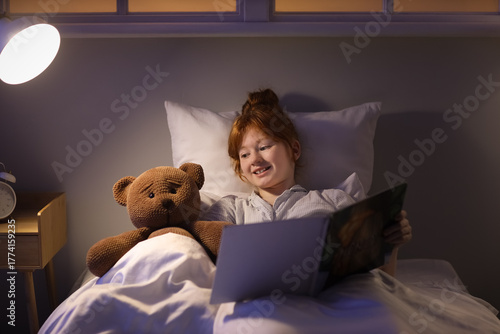 Cute girl with bear toy and...