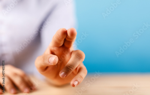 Close up of human hand poin...