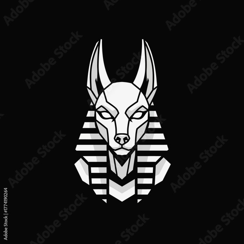Stylized geometric white and grey Anubis head on a black background, depicting the ancient Egyptian god of the afterlife in a modern minimalist art style.