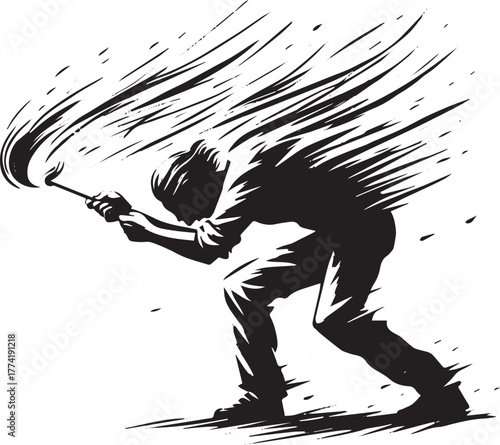 Monochrome depiction of a man battling the elements to ignite a
