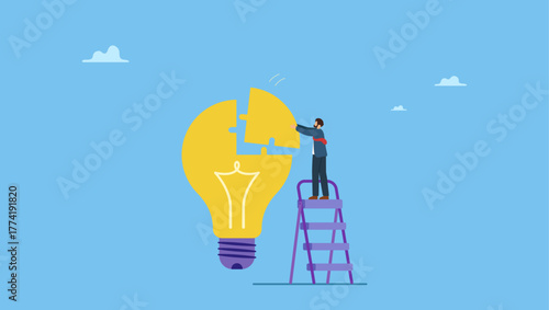 Smart businessman assemble last piece of jigsaw to complete lightbulb idea puzzle. Solve business problem with creativity, finishing or complete brilliant idea, work solution or business idea.