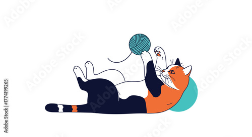 A playful calico cat lies on its back, happily batting at a blue ball of yarn, capturing a moment of feline fun.