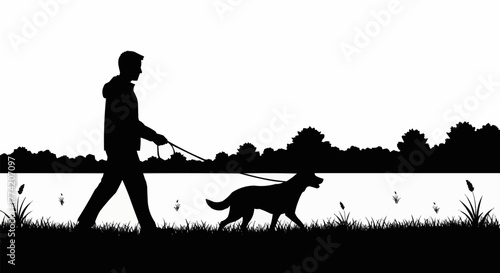 Man walking his dog on a leash by the waters edge.