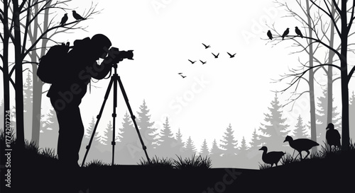 Silhouette of a photographer with a professional camera on a tripod.