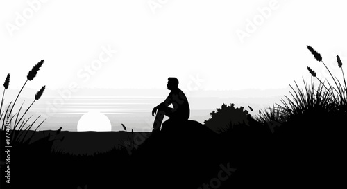 Silhouette of a person contemplating the sunset on a serene evening.