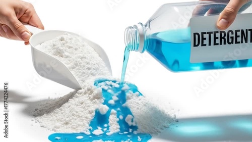 Blue liquid detergent is poured from a bottle onto a pile of white powder