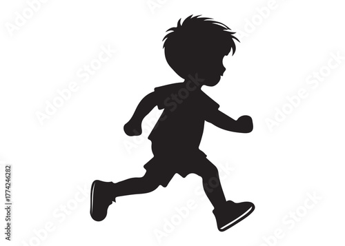 Silhouette of a little boy running