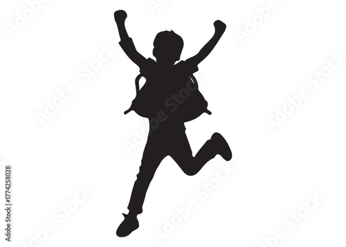 Silhouette of a happy schoolboy jumping with backpack